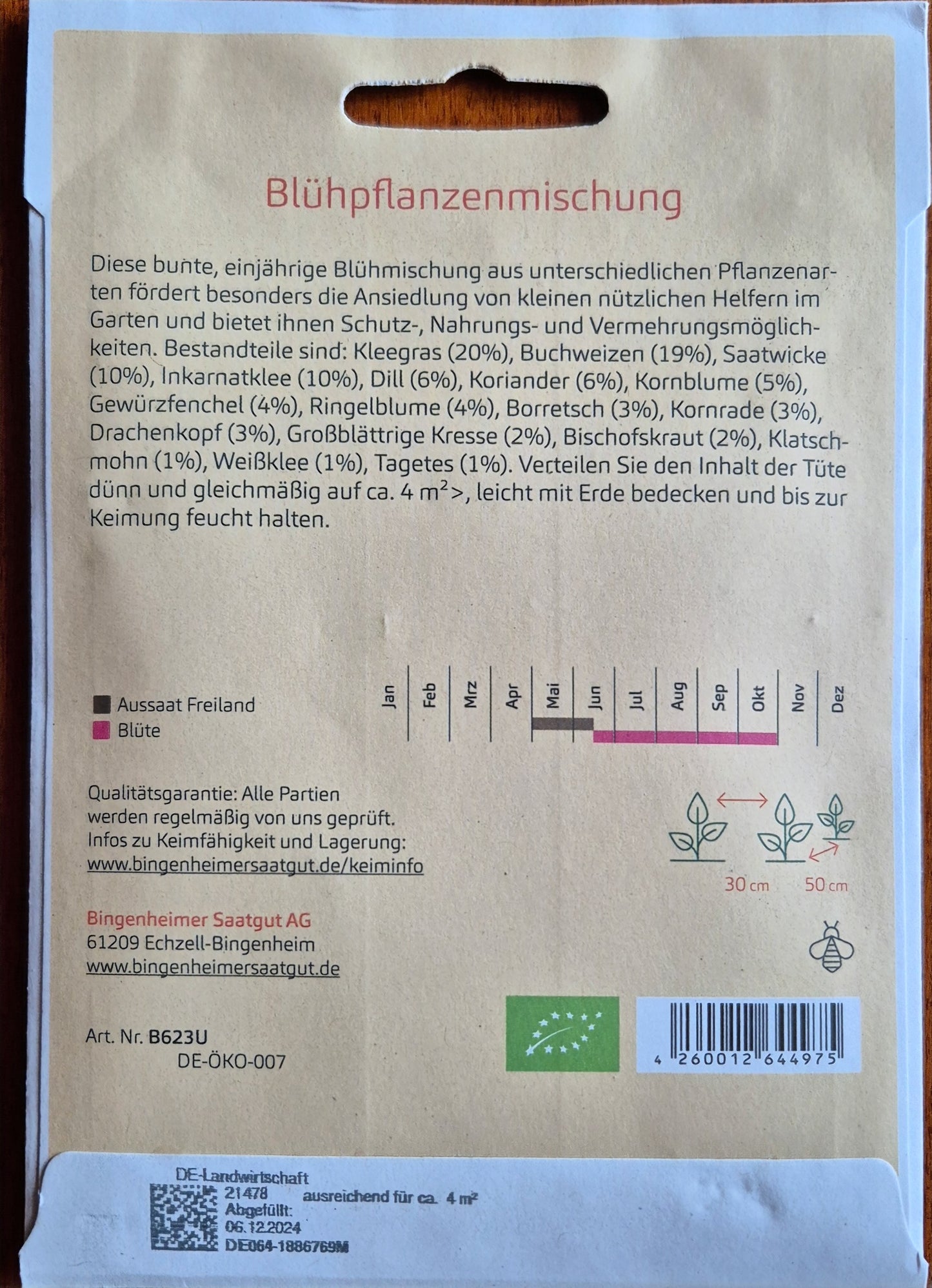 aussaatanleitung_saatgut_info.jpg - Rückseite der Saatgutpackung mit detaillierten Anbauhinweisen, Aussaatkalender und Tipps zur Pflege der Nützlingsparadies-Blühpflanzenmischung.