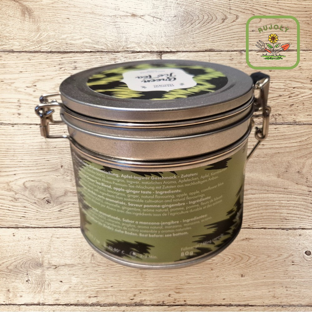 Fruchtiger Grüntee mit Apfel, Ingwer und Zitrone in eleganter Verpackung – ideal für heiße Sommertage.