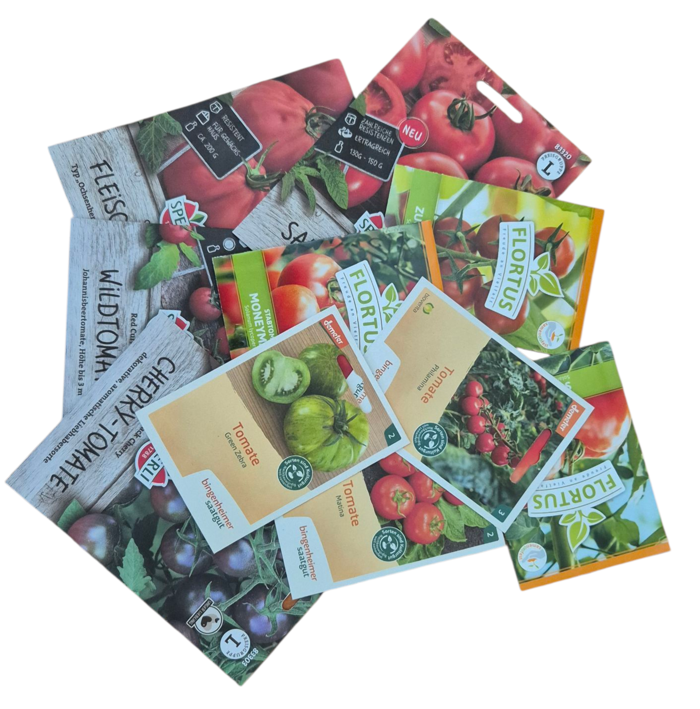 Mehrere Tomatensamen-Tütchen verschiedener Sorten – Cherry, Ochsenherz, Green Zebra, Matina und Moneymaker – Produktfoto.