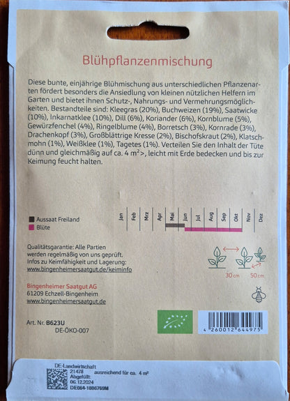 aussaatanleitung_saatgut_info.jpg - Rückseite der Saatgutpackung mit detaillierten Anbauhinweisen, Aussaatkalender und Tipps zur Pflege der Nützlingsparadies-Blühpflanzenmischung.