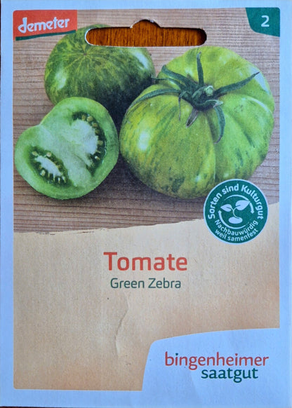 Vorderseite der Saatguttüte Bio-Tomate Green Zebra (Demeter) von Bingenheimer Saatgut mit Abbildung der grüngelb geflammten Tomaten.