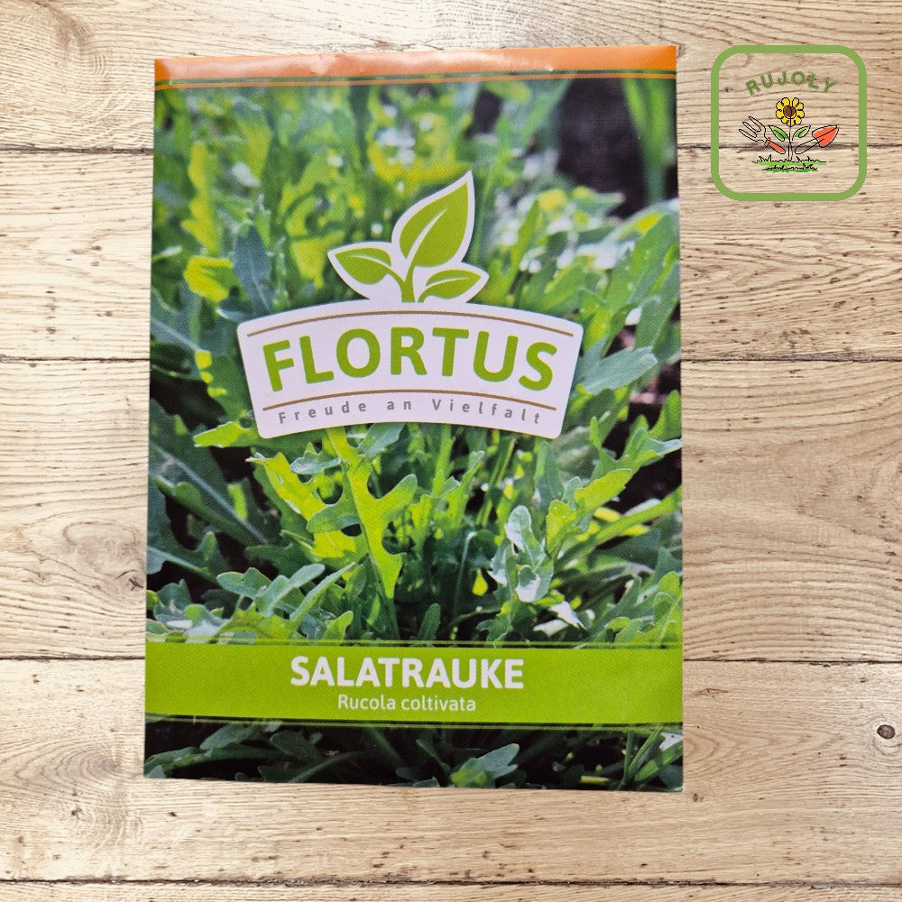 Vorderseite der FLORTUS-Saatguttüte Salatrauke mit grünen Rucolablättern und FLORTUS-Logo.