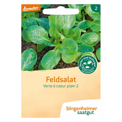 Feldsalat ‘Verte à cœur plein 2’ – samenfestes Saatgut (demeter), Vorderseite der Packung mit dunkelgrünen Rosetten