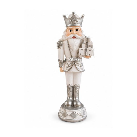 Nussknacker-Figur mit Krone und Geschenken in Weiß und Silber auf weißem Hintergrund